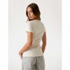 GUESS Floral triangle logo T-shirt BEIGE