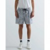 REPLAY RECYCLED FABRIC SWIM SHORTS WITH FLOWER PRINT BLACK/WHITE